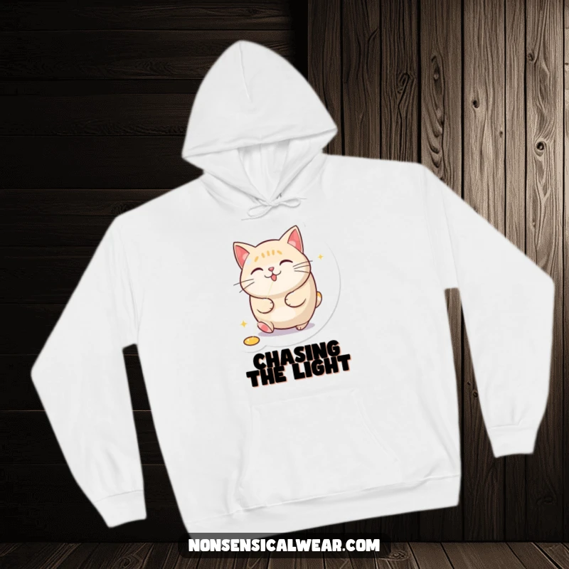 Funny hooded sweatshirt depicting a round, energetic cat chasing a bright red laser pointer dot with comical zeal.