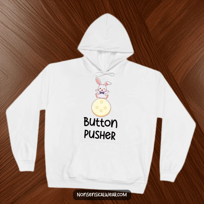 Funny hoodie featuring a playful rabbit in a bow tie, leaping with excitement over a giant button.