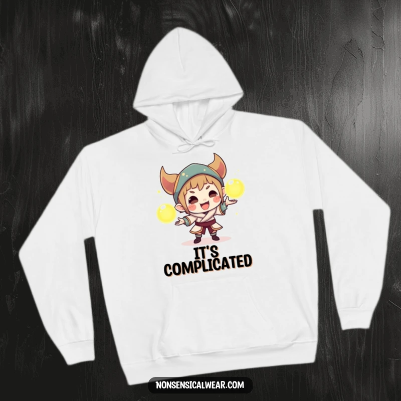 Funny hoodie showing a sly character juggling three radiant orbs, embodying playful trickery and mystical charm in a cozy design.