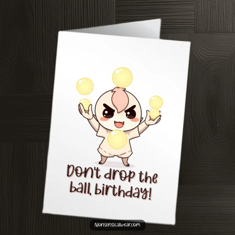 Funny Free Printable Birthday Card: Mischievous character expertly juggles three brightly glowing orbs with a smile.