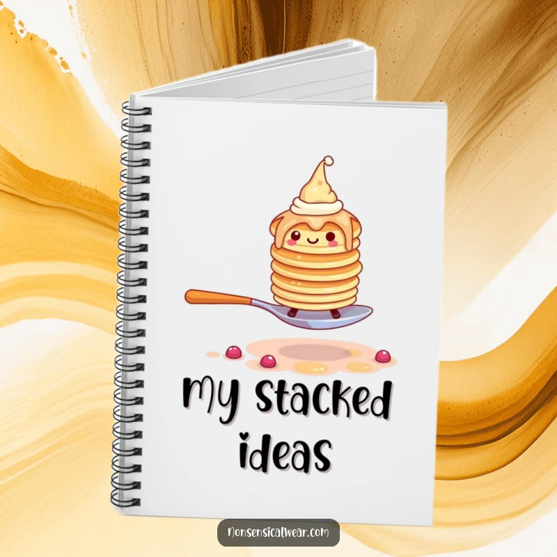 Funny pancake notebook cover with a wobbly stack of pancakes wearing tiny hats attempting to walk on a spoon.